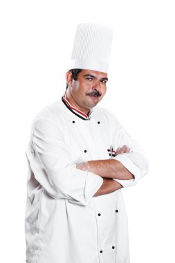 Chef in uniform at kitchen clipart