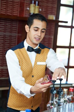 Cheerful arab barman clipart