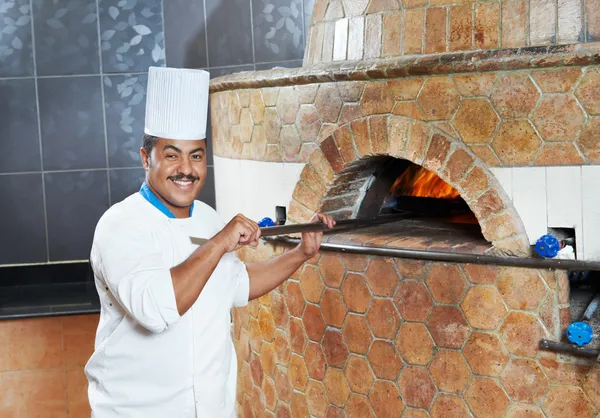 Arab baker chef making Pizza — Stock Photo, Image