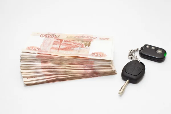 Car key and money cashnotes — Stock Photo, Image