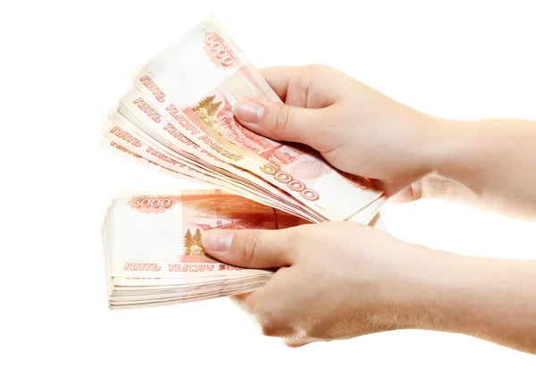 Pacchetto di denaro nelle mani di donne isolate su uno sfondo bianco — Foto Stock
