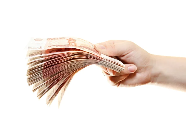 Bundel van geld in de handen van vrouwen geïsoleerd op een witte achtergrond — Stockfoto