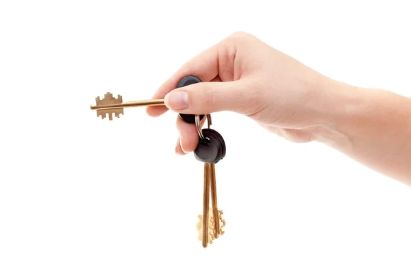 Human hand with bundle of home keys — Stock Photo, Image