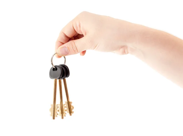 Человеческая рука с связкой ключей от дома — стоковое фото