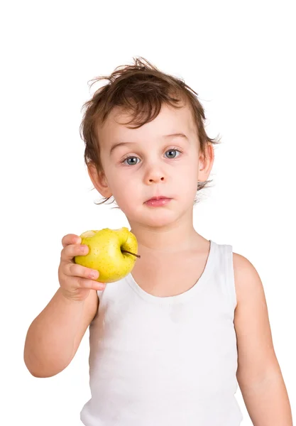 Petit garçon mangeant une pomme. Isolé sur blanc — Photo