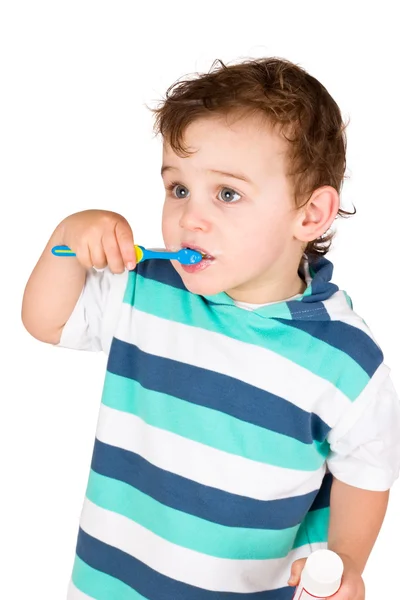 El muchacho limpia los dientes —  Fotos de Stock