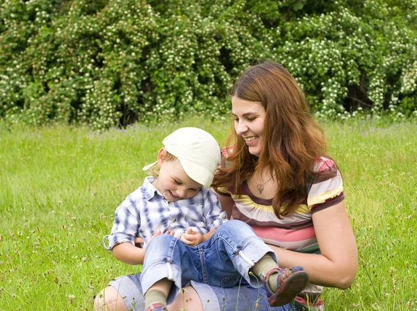 Mother and son in park — Stock Photo, Image