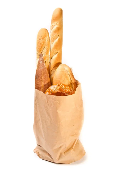 Sacchetto di carta con diversi tipi di pane — Foto Stock