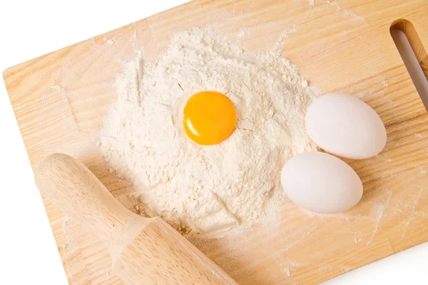 stock image Still life with eggs, flour and wooden board