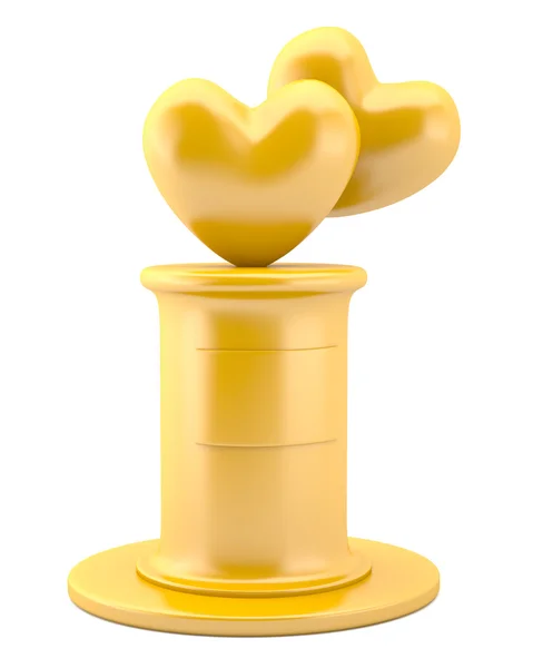 Gold hearts on pedestal — Stock Photo, Image
