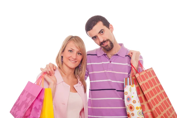 Giovane coppia con shopping bags — Foto Stock
