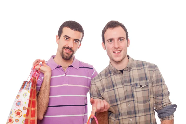 Genç eşcinsel çift ile alışveriş torbaları — Stok fotoğraf