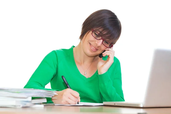 Busy Young Woman at Work in Office Stock Image