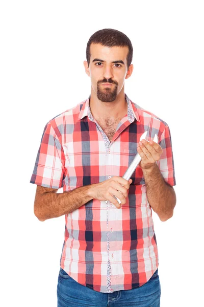 Serious Man Holding a Wrench in the Hands — Stock Photo, Image