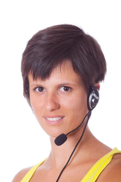 Wesoły recepcjonistka z zestawu słuchawkowego — Zdjęcie stockowe
