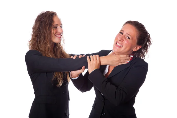 Duas mulheres de negócios lutando — Fotografia de Stock