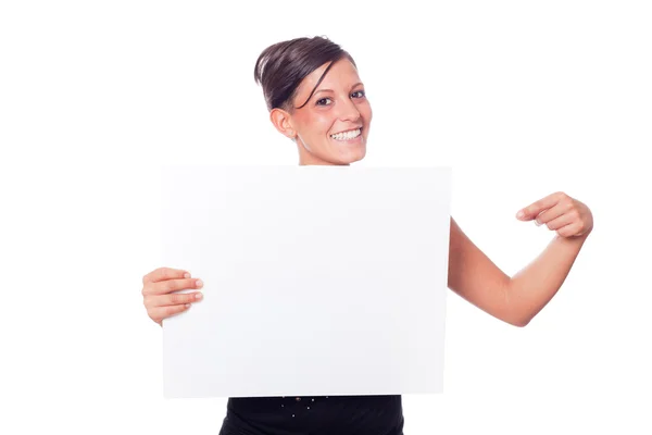 Jovem mulher segurando placa em branco — Fotografia de Stock