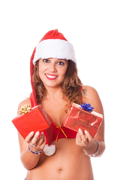 Mujer sexy con sombrero de Santa y regalos de Navidad —  Fotos de Stock