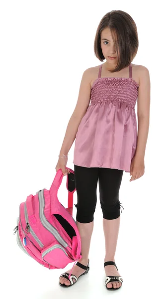 Sad schoolgirl standing with bag. — Stock Photo, Image
