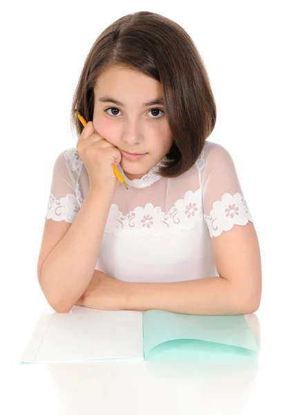 La ragazza con matita e libro di scrittura — Foto Stock