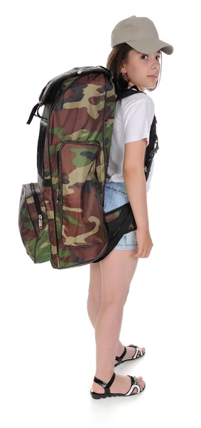 Serious girl standing with backpack. — Stock Photo, Image