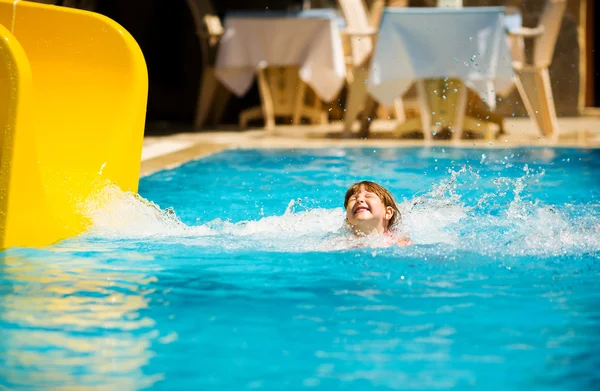 Sliding in pool — Stock Photo, Image