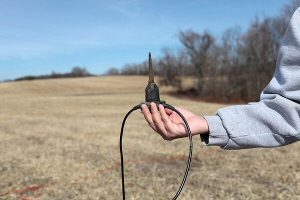 Man holds Sensor Geophones