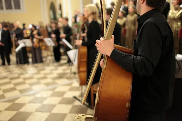 Orchestra in cathedral — Stock Photo, Image