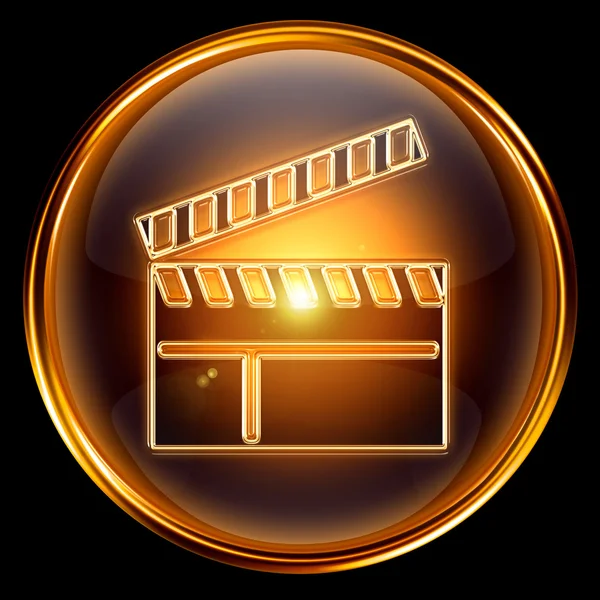 Filmen kläpp ombord ikonen golden, isolerad på svart bakgrund. — Stockfoto