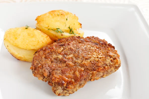 stock image Schnitzel with potatoes