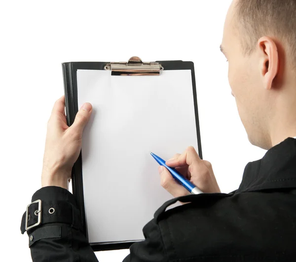 Empresário escrevendo em um papel em branco — Fotografia de Stock