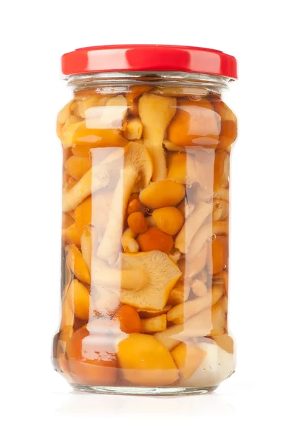 Glass jar of preserved mushrooms — Stock Photo, Image
