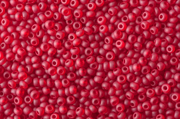Röda pärlor bakgrund — Stockfoto