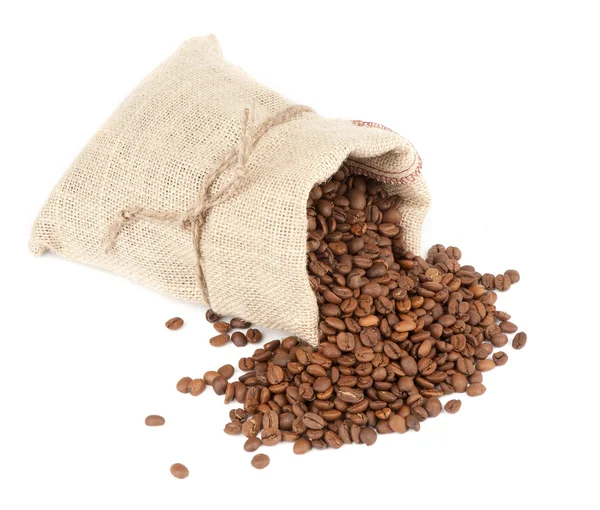 Granos de café y saco de arpillera — Foto de Stock