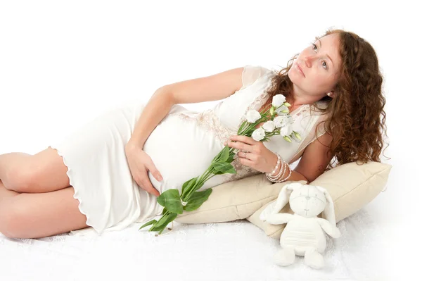 Pregnant woman caressing her belly — Stock Photo, Image