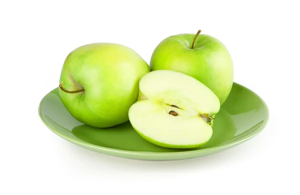 Fresh green apple on a plate — Stock Photo, Image