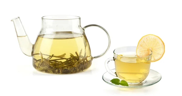 Tea in cup with leaf mint and lemon — Stock Photo, Image