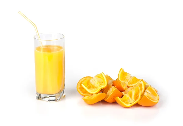Glass of juice and orange peel — Stock Photo, Image