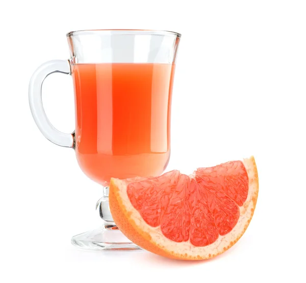 Full glass of grapefruit juice and fruit — Stock Photo, Image