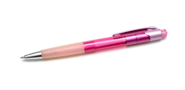 Розовая ручка на белом фоне — стоковое фото