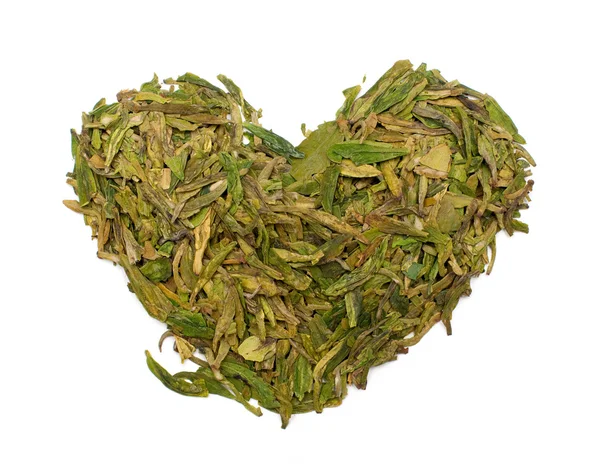 Heart shape from a green tea — Stock Photo, Image