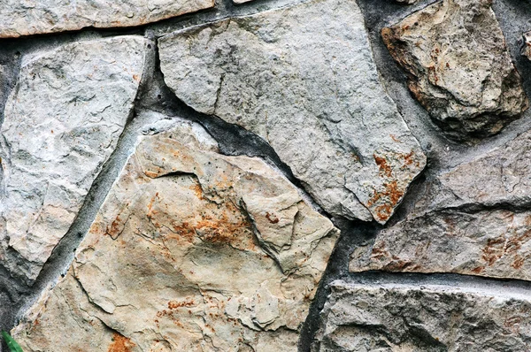 Барвиста і текстурована кам'яна кладка стіни корисна для фону — стокове фото