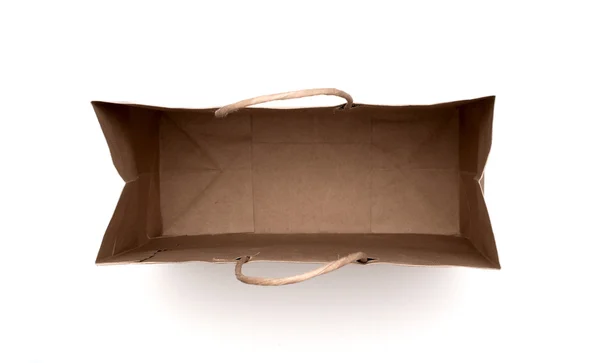 Bruine papieren zak geïsoleerd op een witte achtergrond. — Stockfoto