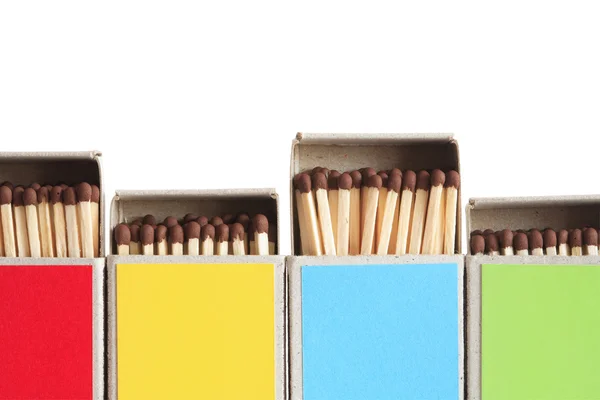 Beyaz üzerine rengarenk kibrit kutuları — Stok fotoğraf