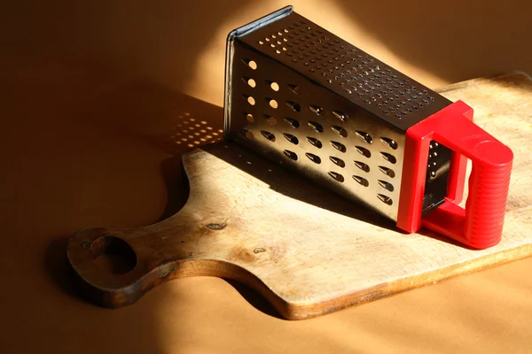 Grater On Cutting Board — Stock Photo, Image