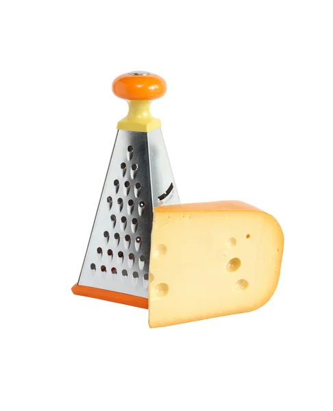 Сыр и терка — стоковое фото