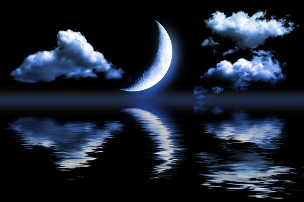Metade da lua no céu azul escuro — Fotografia de Stock