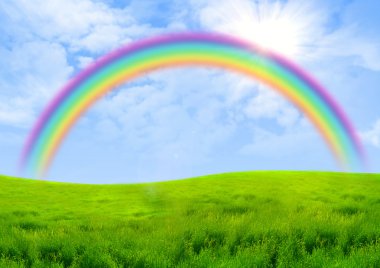 Rainbow over a green glade clipart