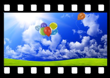 Filmstrip with color balloons in the dark blue sky clipart