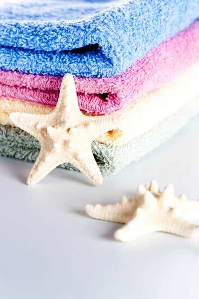 Handdoeken en zeesterren — Stockfoto